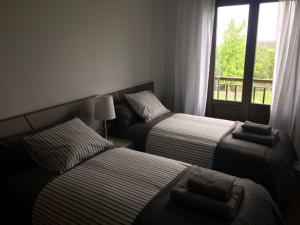 Postel nebo postele na pokoji v ubytování Apartamentos Campo de Golf