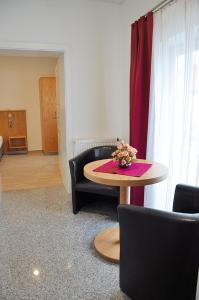Posezení v ubytování Garni Hotel Alber