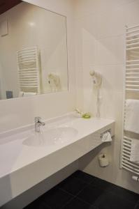 Koupelna v ubytování Garni Hotel Alber
