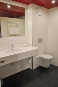 Koupelna v ubytování Garni Hotel Alber