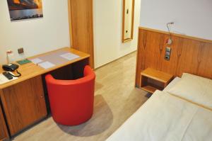 Postel nebo postele na pokoji v ubytování Garni Hotel Alber