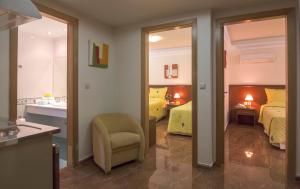 Postel nebo postele na pokoji v ubytování Porto Alegre Hotel