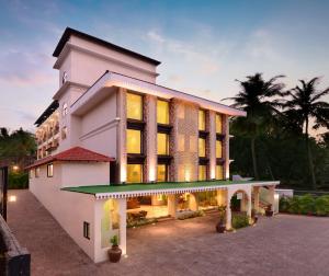 a rendering of a hotel at dusk at Rio Boutique in Candolim