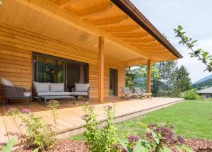 Garður fyrir utan Das Leonhard - Naturparkhotel am Weissensee