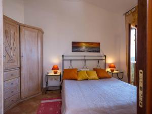 Säng eller sängar i ett rum på La Casa sul Mare