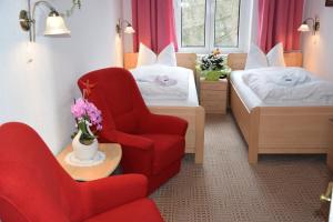 Postel nebo postele na pokoji v ubytování Hotel Nordlicht