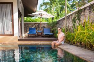 Bazén v ubytování Angkor Palace Suite & Villa nebo v jeho okolí