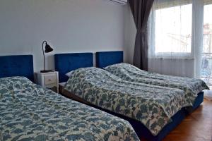 Postel nebo postele na pokoji v ubytování Apartment Anna Split With Parking