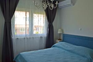 Postel nebo postele na pokoji v ubytování Apartment Anna Split With Parking