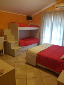 A bed or beds in a room at Il Laghetto