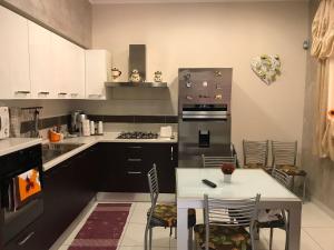 Kuchyň nebo kuchyňský kout v ubytování Casa Angela