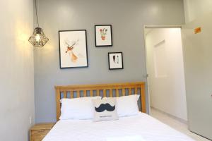 Postel nebo postele na pokoji v ubytování Long Hostel