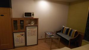 Kuchyň nebo kuchyňský kout v ubytování Hotel Essor (Adult Only)