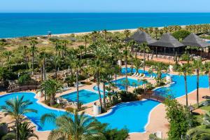 an aerial view of the pool at the resort at Puerto Antilla Grand Hotel in Islantilla