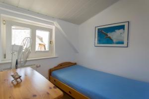 Postel nebo postele na pokoji v ubytování Haus Rosengarten