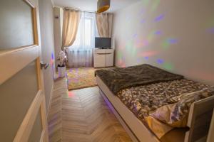 Posteľ alebo postele v izbe v ubytovaní Apartament Bon Appetit - Krupówki-Zakopane