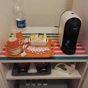 Príslušenstvo na prípravu kávy alebo čaju v ubytovaní Like Home Cisanello