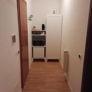 Kuchyňa alebo kuchynka v ubytovaní Like Home Cisanello