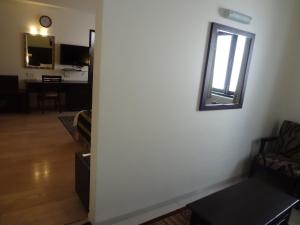 TV a/nebo společenská místnost v ubytování Chateau Windsor Hotel - Marine Drive