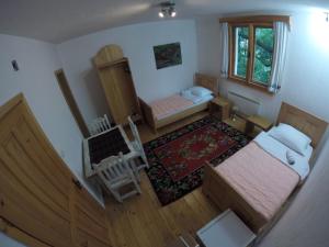 מיטה או מיטות בחדר ב-Etno kutak Prijepolje