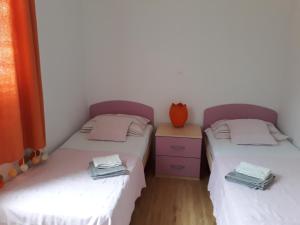 Posteľ alebo postele v izbe v ubytovaní Kuća za odmor Lavanda