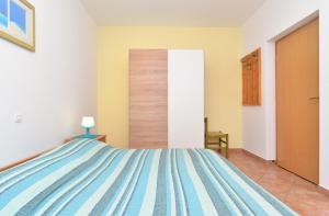 Postel nebo postele na pokoji v ubytování Apartments Denis 344