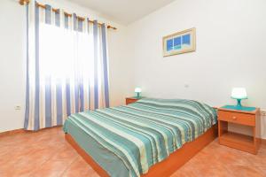 Postel nebo postele na pokoji v ubytování Apartments Denis 344