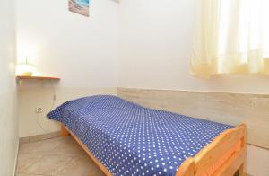 Postel nebo postele na pokoji v ubytování Apartments Denis 344
