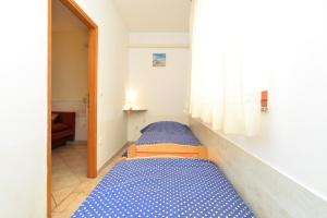 Postel nebo postele na pokoji v ubytování Apartments Denis 344