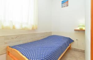 Postel nebo postele na pokoji v ubytování Apartments Denis 344