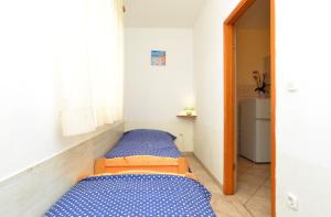 Postel nebo postele na pokoji v ubytování Apartments Denis 344