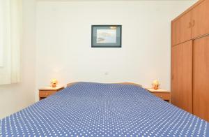 Postel nebo postele na pokoji v ubytování Apartments Denis 344