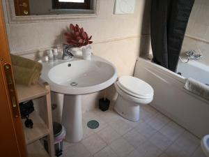 A bathroom at Perugino Apartments