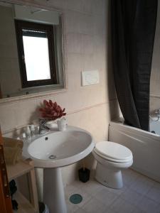 A bathroom at Perugino Apartments