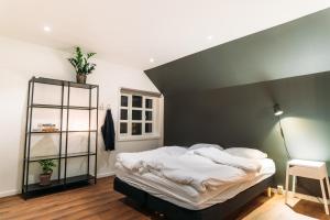 Postel nebo postele na pokoji v ubytování Lofoten Apartments