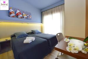 Кровать или кровати в номере Nuevo Norat Sanxenxo