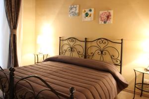 
A bed or beds in a room at B&B Residenza Umberto
