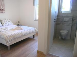 Koupelna v ubytování Apartman Danijel + 37 fotografií