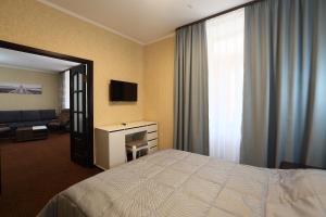 Postel nebo postele na pokoji v ubytování Oberig Hotel + 37 fotografií