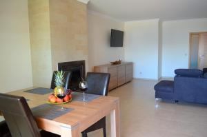 TV a/nebo společenská místnost v ubytování Marina Beach Apartment