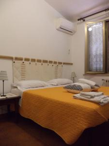 Postel nebo postele na pokoji v ubytování Da Fiore