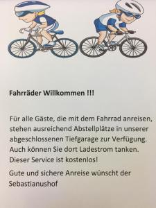 a picture of a child riding a bike at Hotel-Restaurant Sebastianushof in Bonn