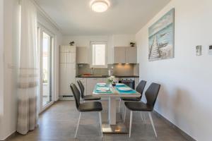 Kuchyň nebo kuchyňský kout v ubytování Apartments Villa 19