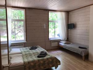 Postel nebo postele na pokoji v ubytování Tientaus 1 Apartments