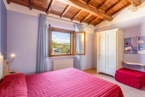 Posteľ alebo postele v izbe v ubytovaní Agriturismo Dei Casali