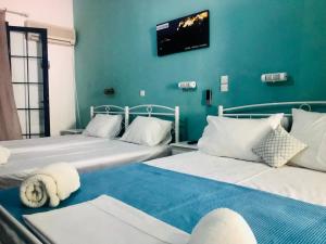 Postel nebo postele na pokoji v ubytování Contaratos Holiday Lettings