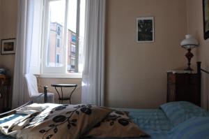 Postel nebo postele na pokoji v ubytování Il Ciottolo