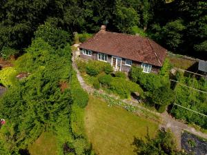 an aerial view of a house with a stone wall at Spacious home in Bath, nature and city! in Bath