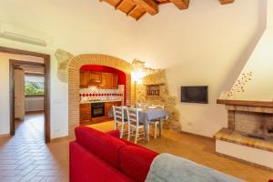 TV a/nebo společenská místnost v ubytování Agriturismo Dei Casali