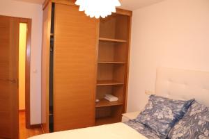 En eller flere senge i et værelse på Grupoele3 Edificio Mar Langosteira